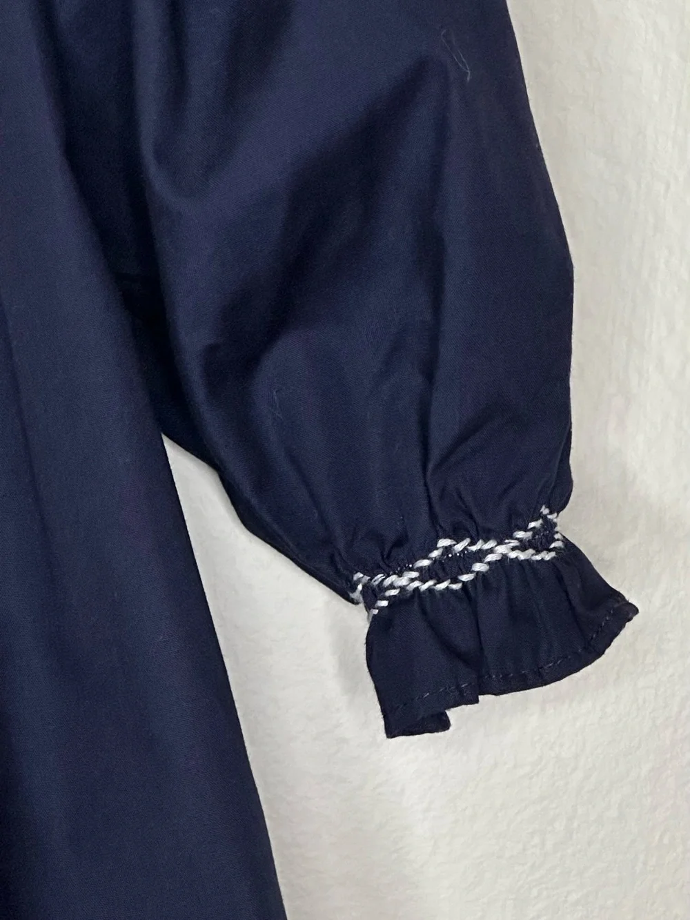 The Beaufort Bonnet Co. 4 T navy and white bishop smocked dress.